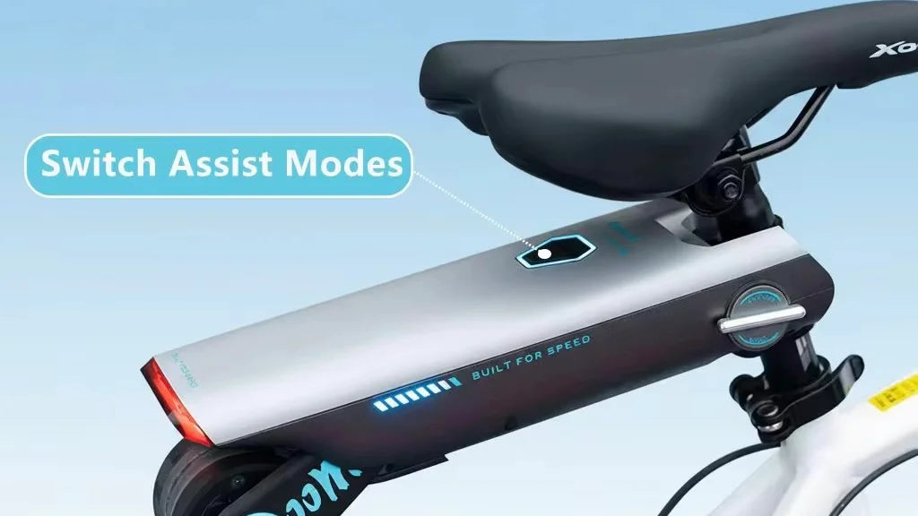 P.wheel bike booster mounted below a bicycle saddle, highlighting the assist mode selection button